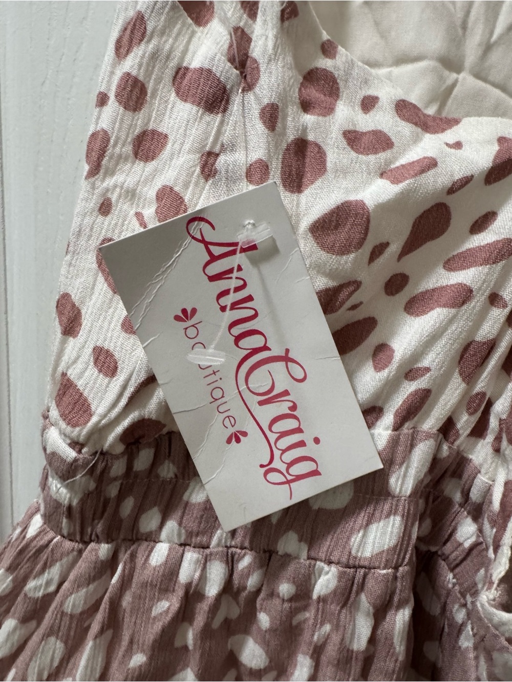 Sleeveless V-Neck Polka Dot Romper in Dusty Rose and White - Picture 5 of 6